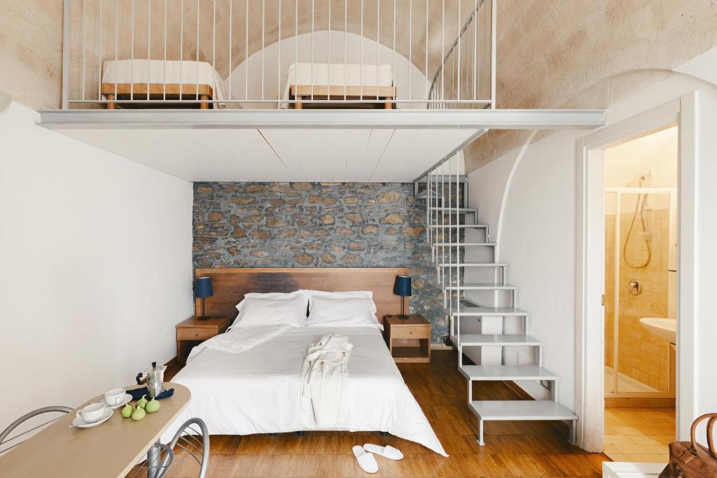 Posteľ alebo postele v izbe v ubytovaní Il Borgo Ritrovato - Albergo Diffuso