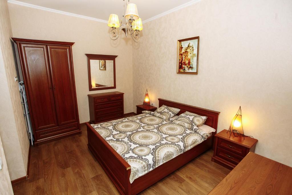 Кровать или кровати в номере Apartment near Museum