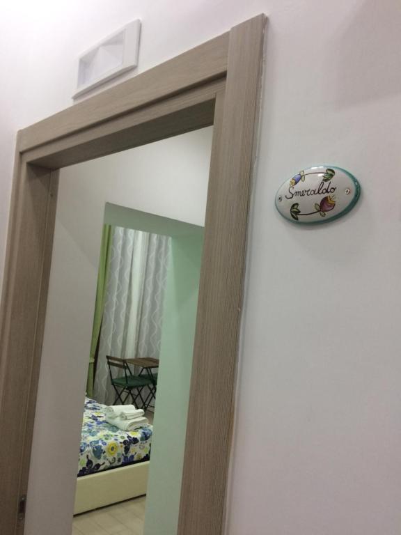 A bed or beds in a room at Decumani Prestige