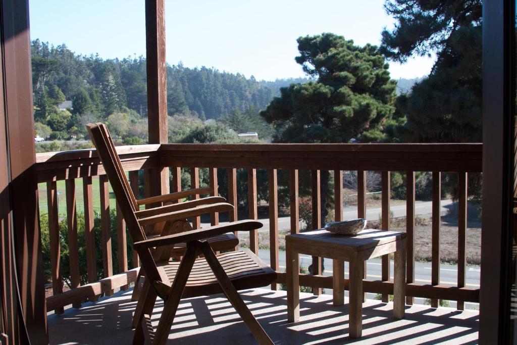 a pair of chairs and a table on a porch at Mendocino View East in Mendocino