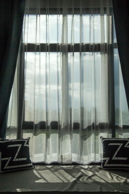 Posezení v ubytování Triple Z Hotel