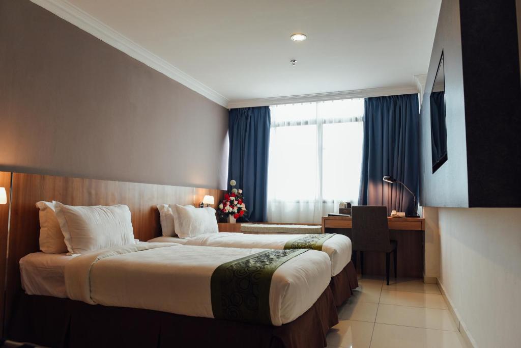 Katil atau katil-katil dalam bilik di Hotel Sfera