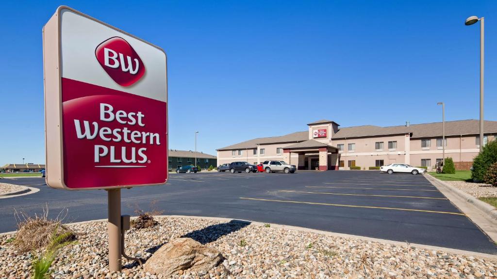 a best western plus sign in a parking lot at Best Western Plus Albert Lea I-90/I-35 Hotel in Albert Lea