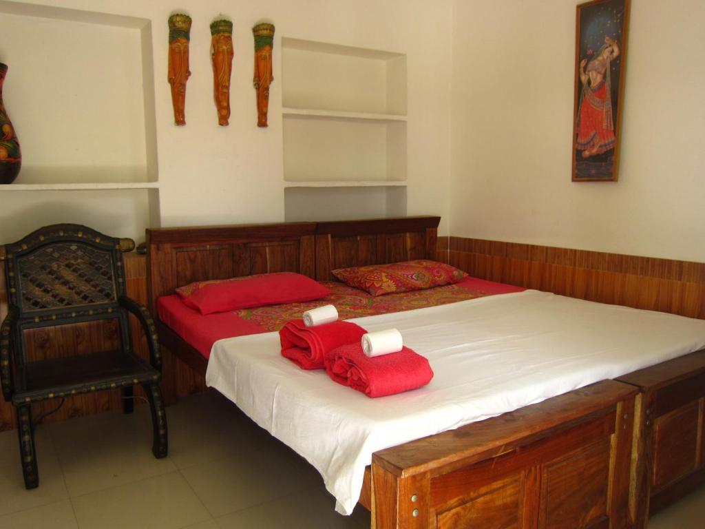 Postel nebo postele na pokoji v ubytování Atithi Guest House Pushkar