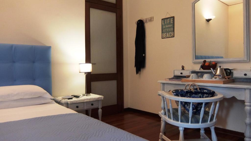 Postel nebo postele na pokoji v ubytování La Casa di Enrico