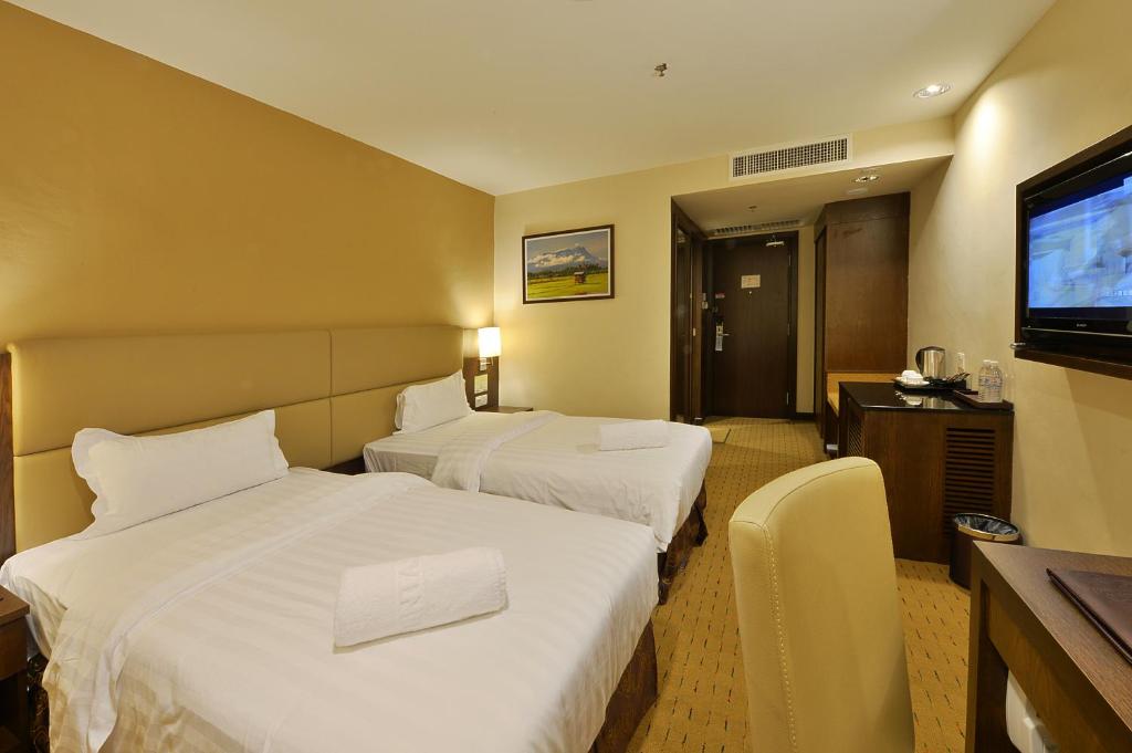 TV a/nebo společenská místnost v ubytování Lintas View Hotel