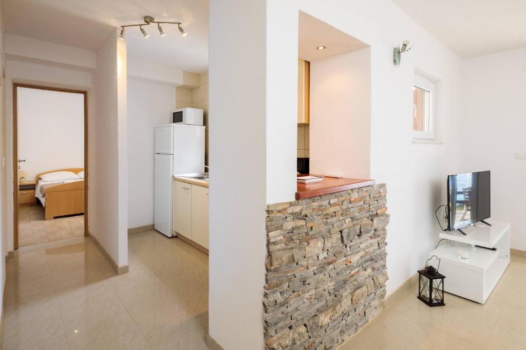 TV a/nebo společenská místnost v ubytování Pavao Apartments