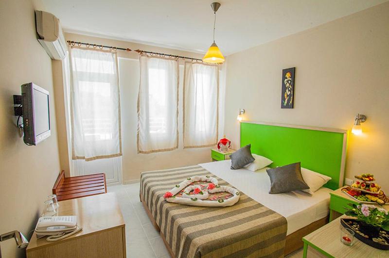 Postel nebo postele na pokoji v ubytování Hotel Dream Of Side