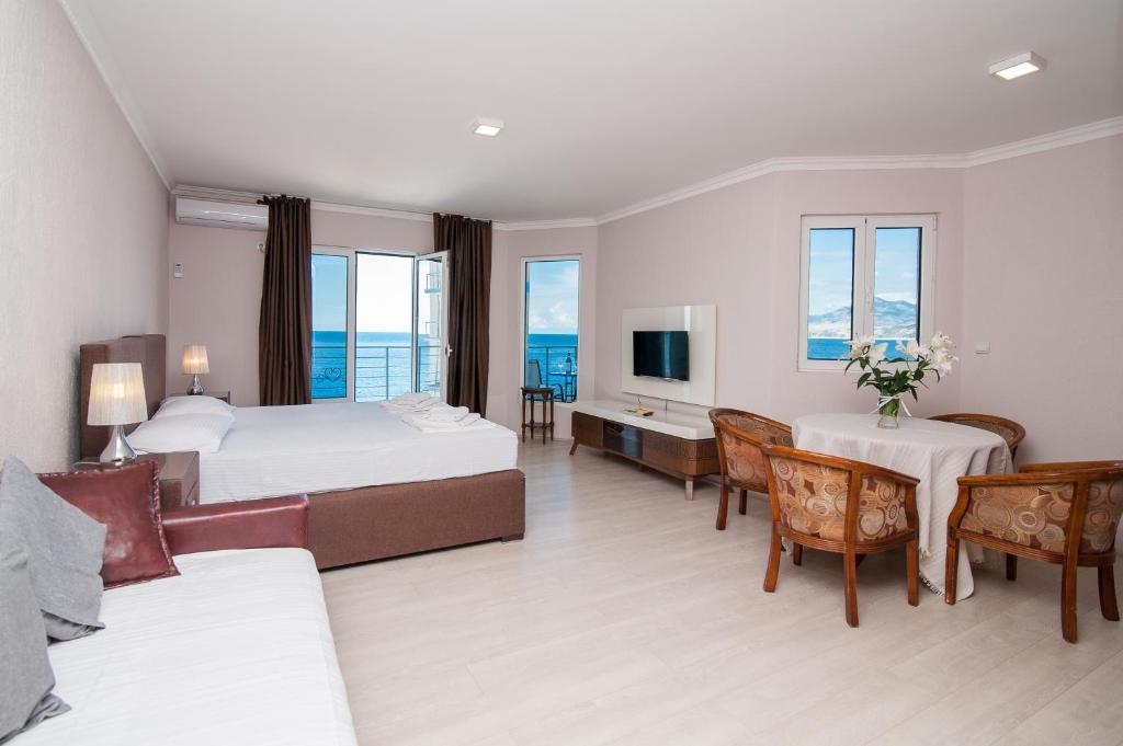 Postel nebo postele na pokoji v ubytování Open Sea Apartments