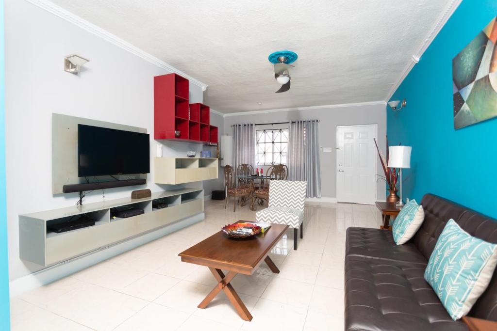 TV a/nebo společenská místnost v ubytování Casa Alexandria Guest Apartment