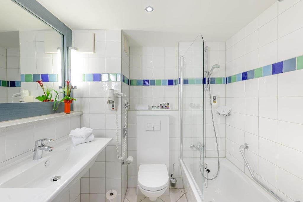 Koupelna v ubytování Mercure Hotel München Süd Messe