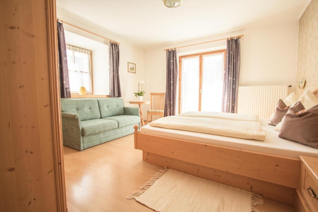 Postel nebo postele na pokoji v ubytování Mutznhof