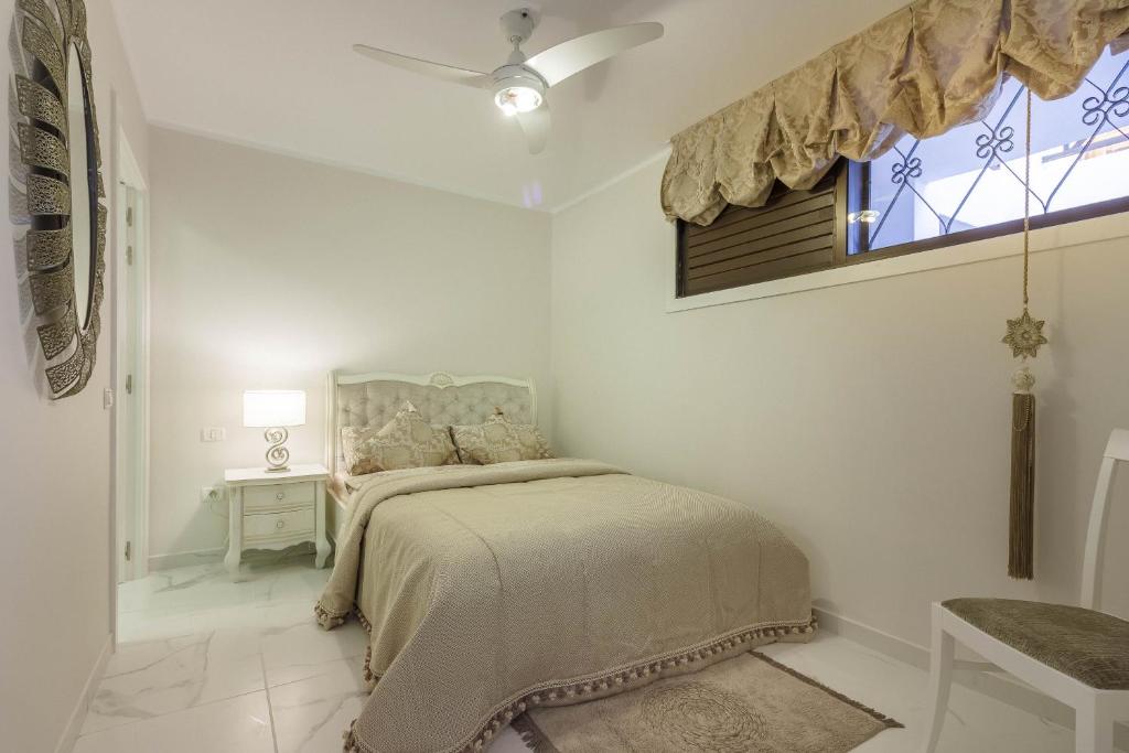 Postel nebo postele na pokoji v ubytování Front Line Parque Santiago 2 Lux Apartament