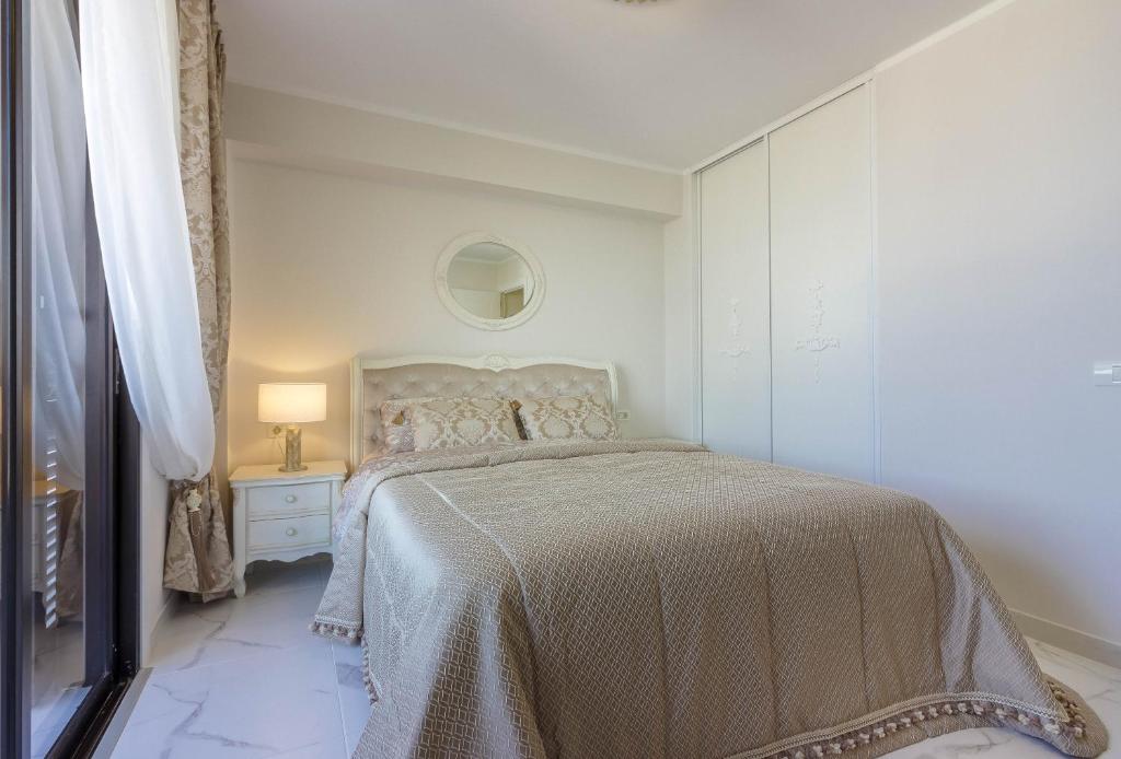 Postel nebo postele na pokoji v ubytování Front Line Parque Santiago 2 Lux Apartament