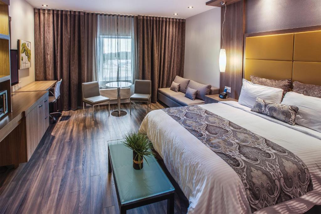 Postel nebo postele na pokoji v ubytování Hôtel Universel, Centre de congrès Rivière-du-Loup