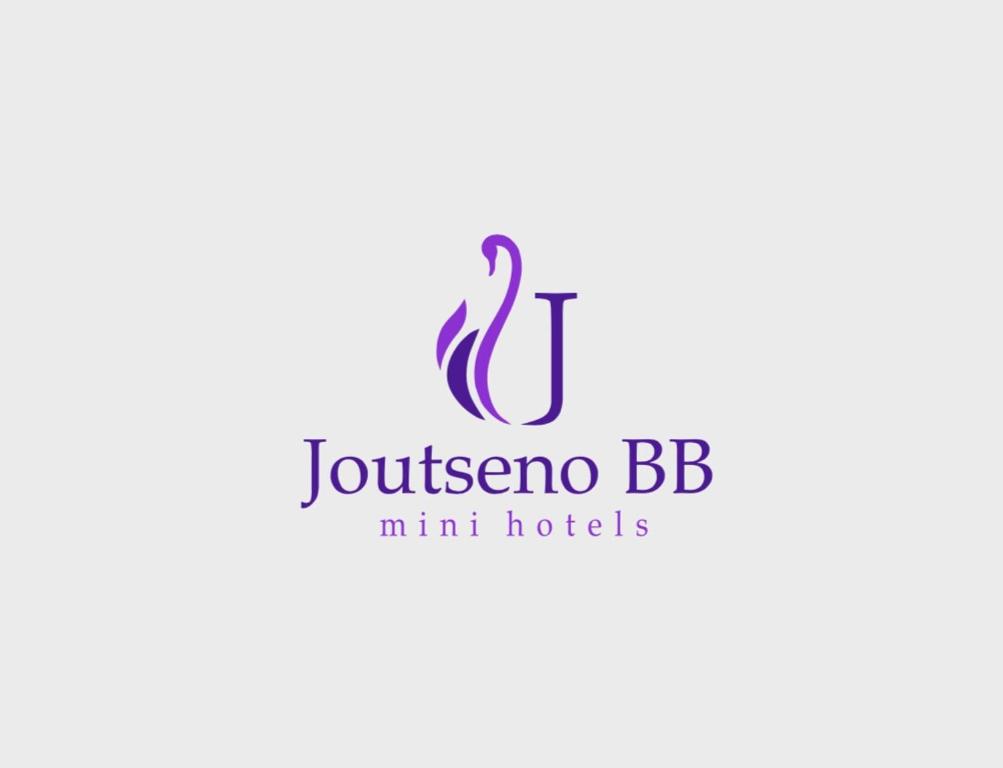 een logo voor een hotel met een dolfijn bij Joutseno BB in Joutseno