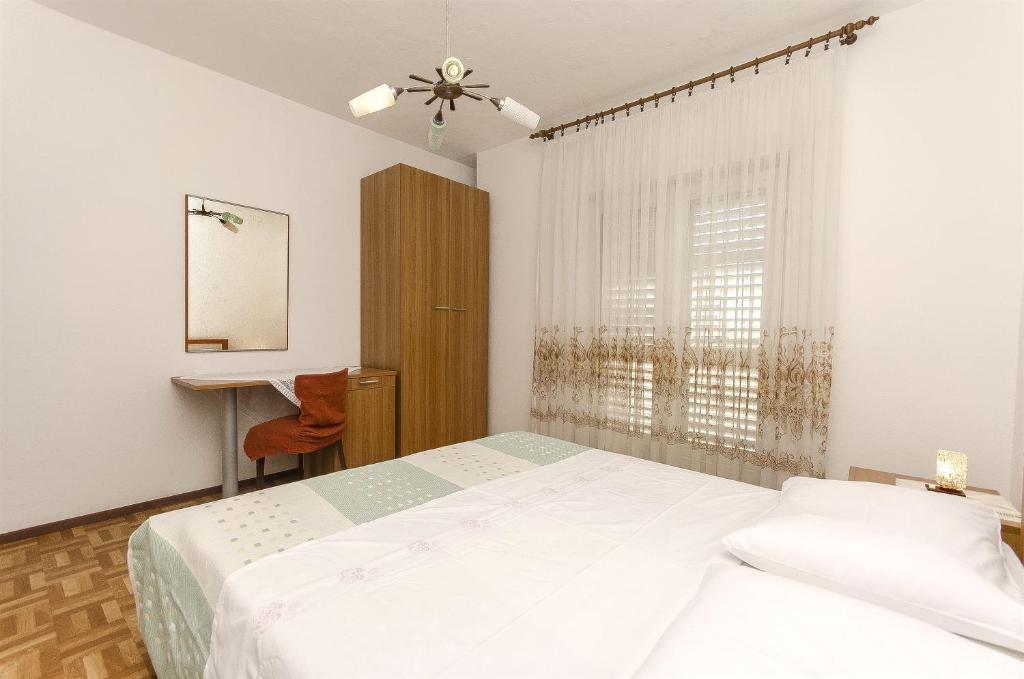 Postel nebo postele na pokoji v ubytování Apartment Niko