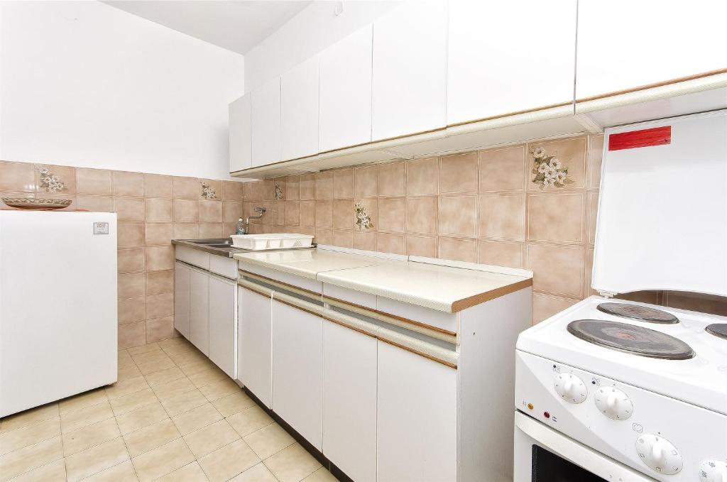 Kuchyň nebo kuchyňský kout v ubytování Apartment Niko