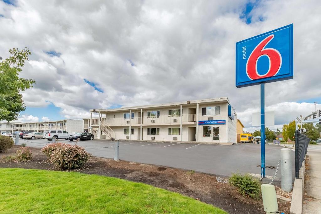a sign in front of a building with a number six at Motel 6-Beaverton, OR in Beaverton