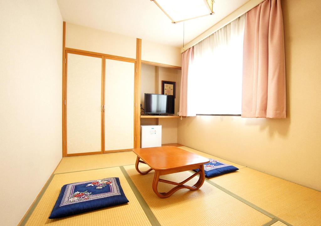 TV a/nebo společenská místnost v ubytování Hotel Trend Matsumoto