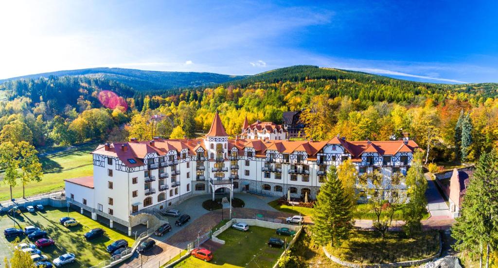 an aerial view of a resort with trees at Hotel Buczyński****Medical&SPA in Świeradów-Zdrój