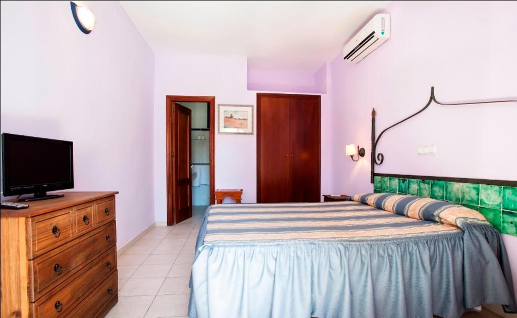 TV a/nebo společenská místnost v ubytování Hotel Atalaya