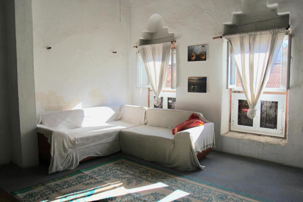 Postel nebo postele na pokoji v ubytování Firefly Boutique Lodge