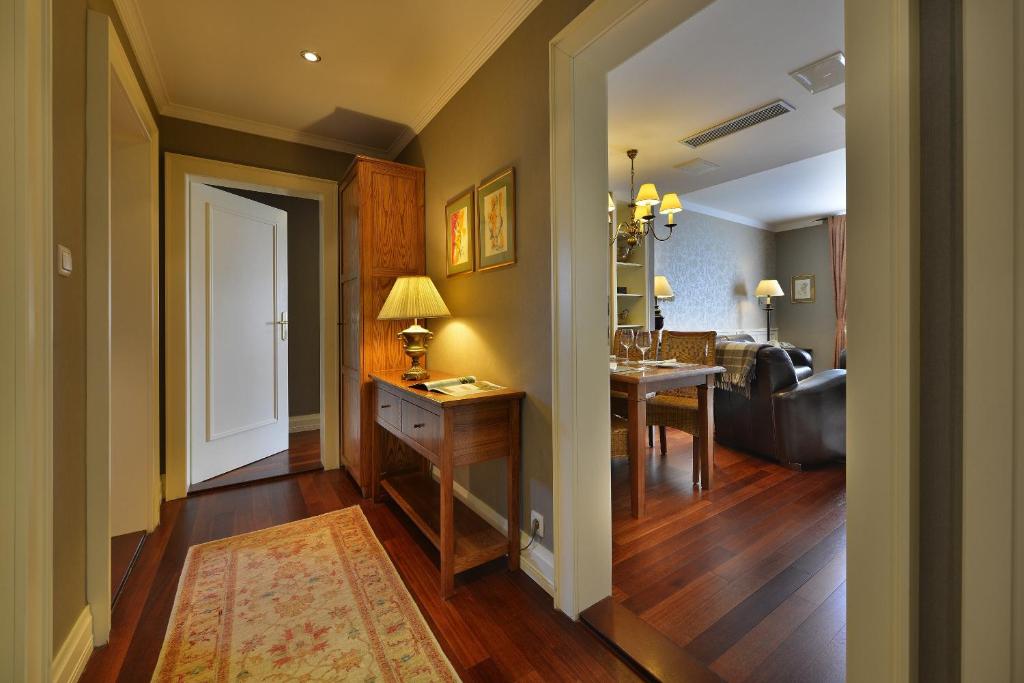 Postel nebo postele na pokoji v ubytování Marrol's Boutique Hotel