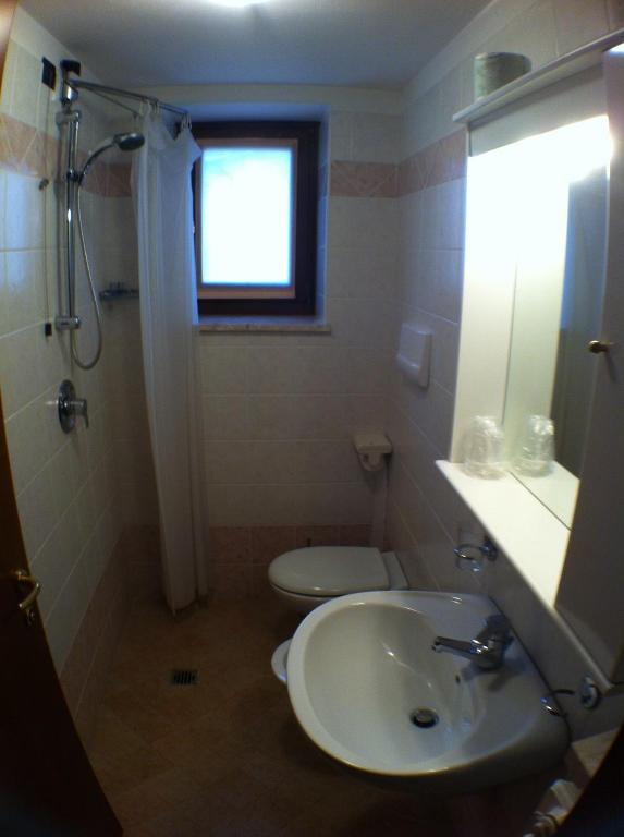Koupelna v ubytování Hotel Scandola