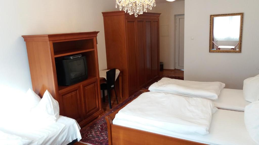 Posteľ alebo postele v izbe v ubytovaní Hotel Gratkorn - "Bed & Breakfast"