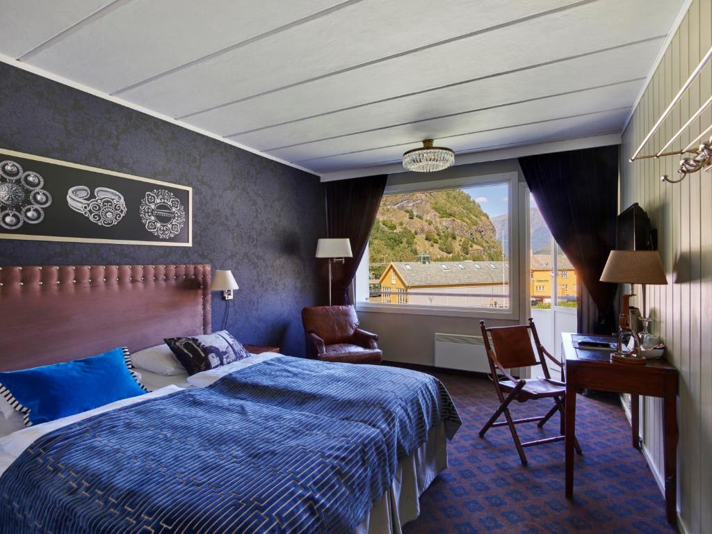Postel nebo postele na pokoji v ubytování Fretheim Hotel