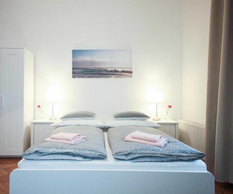 Postel nebo postele na pokoji v ubytování Angel City Aparthotel