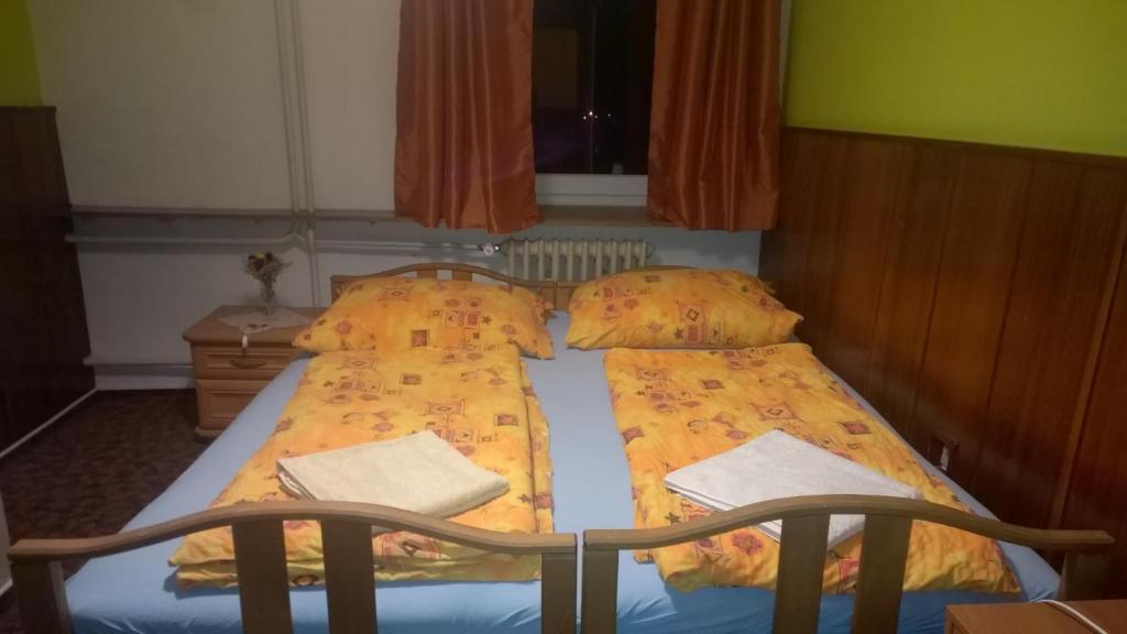 Postel nebo postele na pokoji v ubytování Penzion Lipůvka