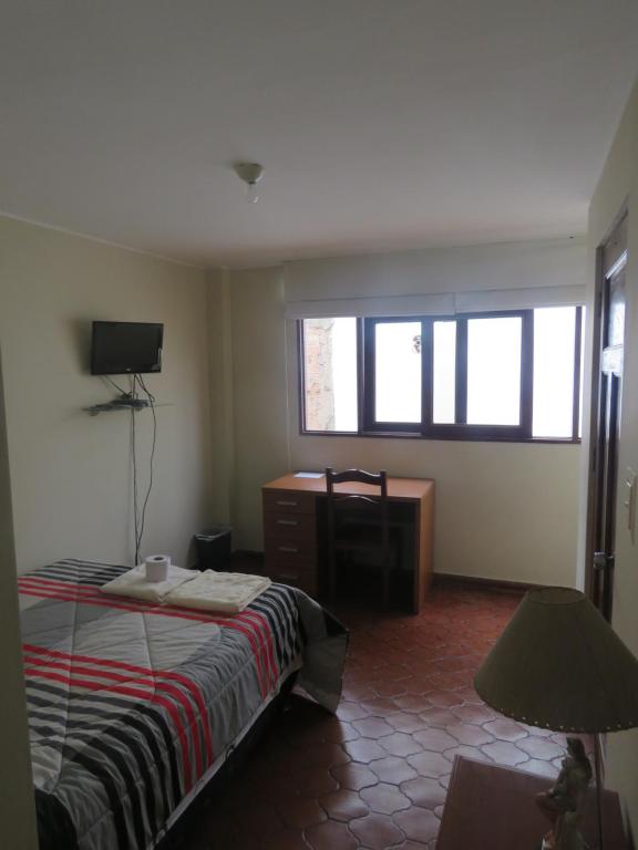 Postel nebo postele na pokoji v ubytování Casa particular de Jorge Edinson