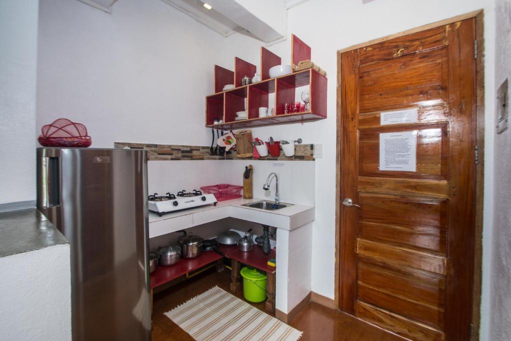 Kuchyň nebo kuchyňský kout v ubytování Lanterna Hotel Boracay