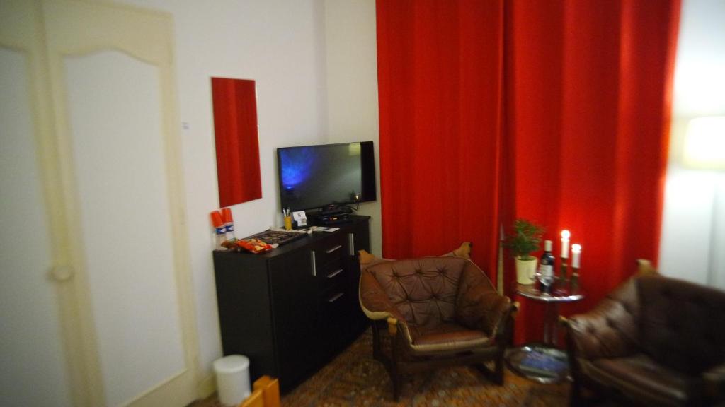 TV a/nebo společenská místnost v ubytování Le Balcon des Jasses