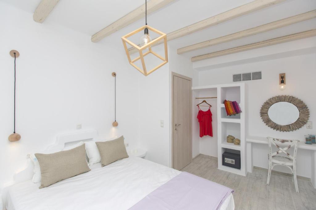 Postel nebo postele na pokoji v ubytování Salinus Beachfront Private Pool Villas