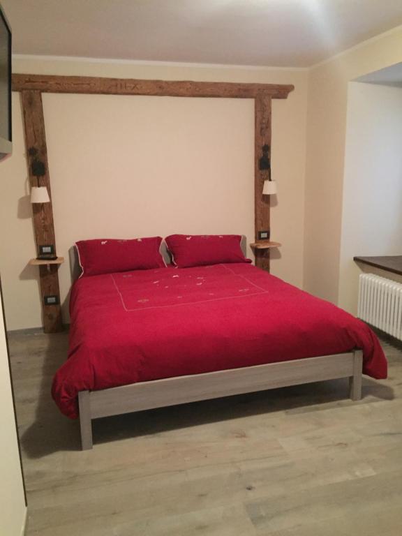 A bed or beds in a room at La Boule de Neige