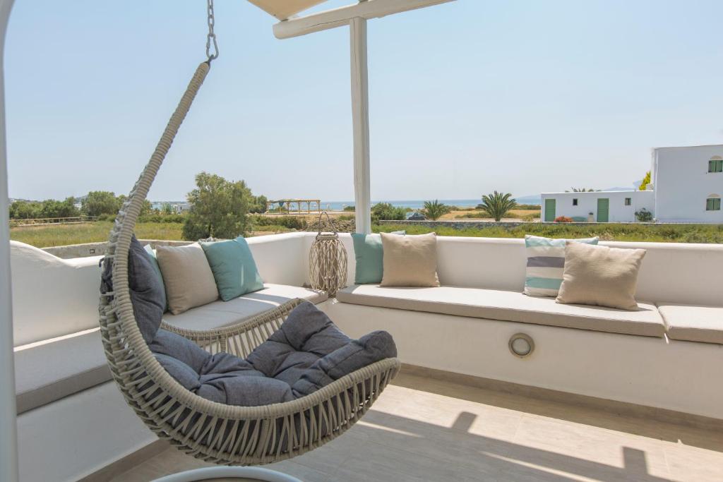 Posezení v ubytování Salinus Beachfront Private Pool Villas