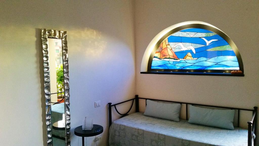 Postel nebo postele na pokoji v ubytování Cinqueterre Residence