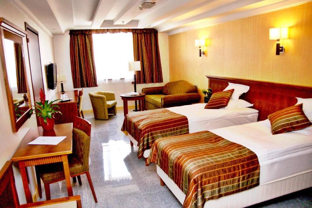 Posteľ alebo postele v izbe v ubytovaní Actor Hotel Budapest