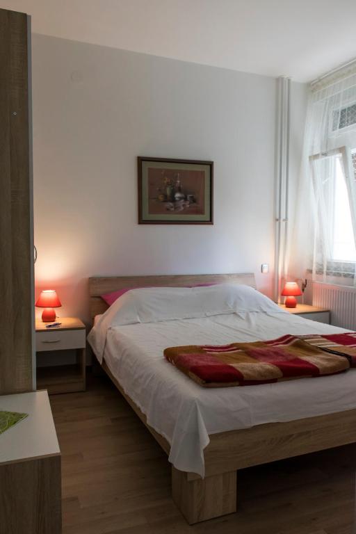 Posteľ alebo postele v izbe v ubytovaní Apartmani Borko