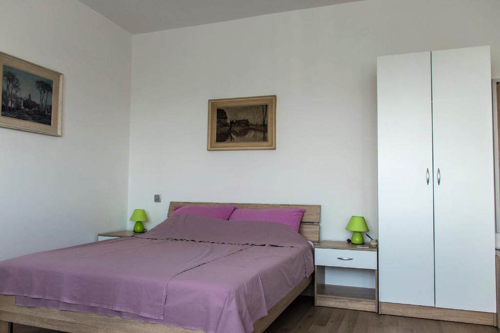Posteľ alebo postele v izbe v ubytovaní Apartmani Borko