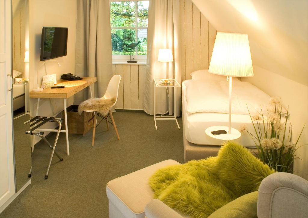 TV a/nebo společenská místnost v ubytování Hotel Auszeit