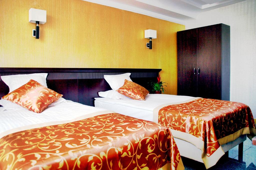 Posteľ alebo postele v izbe v ubytovaní Actor Hotel Budapest