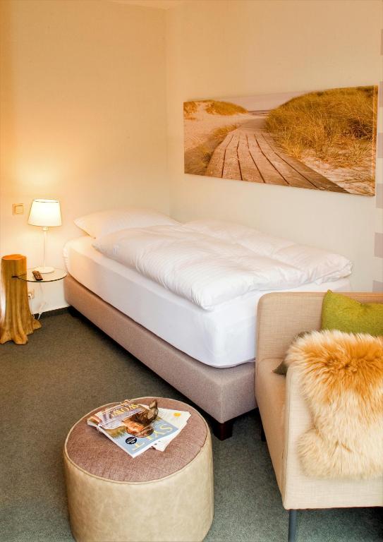 Postel nebo postele na pokoji v ubytování Hotel Auszeit