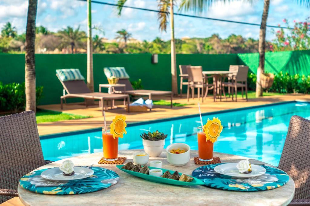 A piscina localizada em Pousada Villa Maeva Itacimirim ou nos arredores
