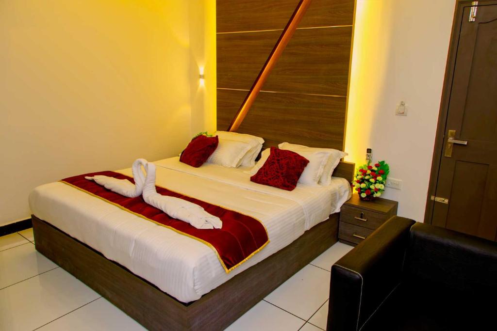 Postel nebo postele na pokoji v ubytování Palette Hill View Resorts Vagamon