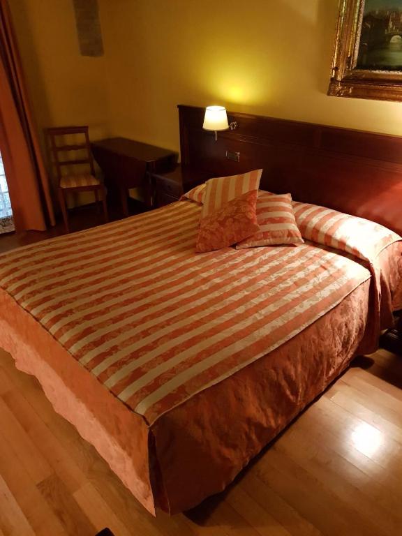 Postel nebo postele na pokoji v ubytování Barchessa Contarini