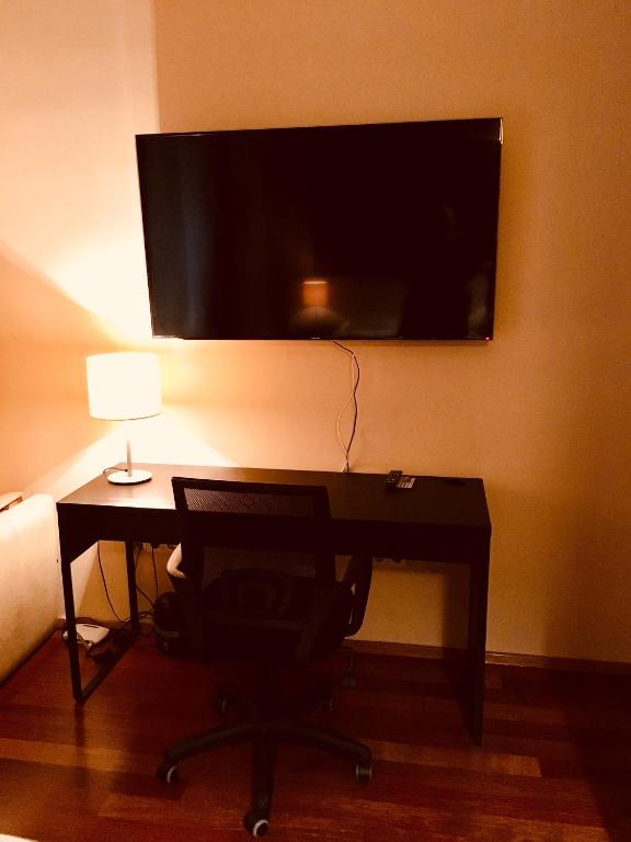 TV a/nebo společenská místnost v ubytování Atrium Panzio